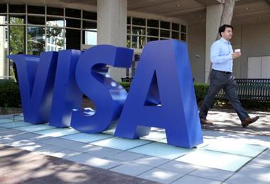 Bild: Visa übertrifft Erwartungen und streicht Stellen